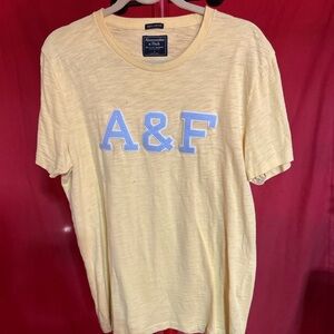Abercrombie & Fitch Light Yellow Tee with Blue Applique